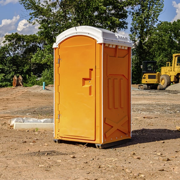 what is the cost difference between standard and deluxe portable restroom rentals in Amo Indiana